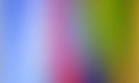 Unscharfer Farbverlauf von Blau über Violett und Pink bis zu Grün und Gelb, von links nach rechts.