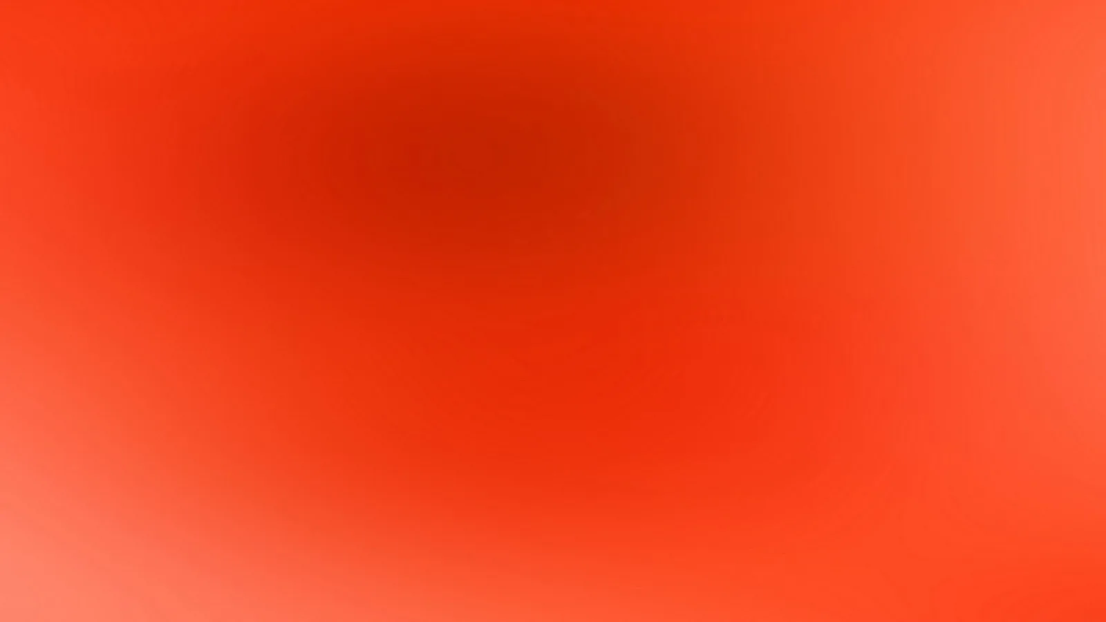 Weicher Farbverlauf von tiefem Rot in der oberen Mitte zu hellem Orange an den Rändern, ohne erkennbare Formen.