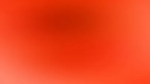 Weicher Farbverlauf von tiefem Rot in der oberen Mitte zu hellem Orange an den Rändern, ohne erkennbare Formen.