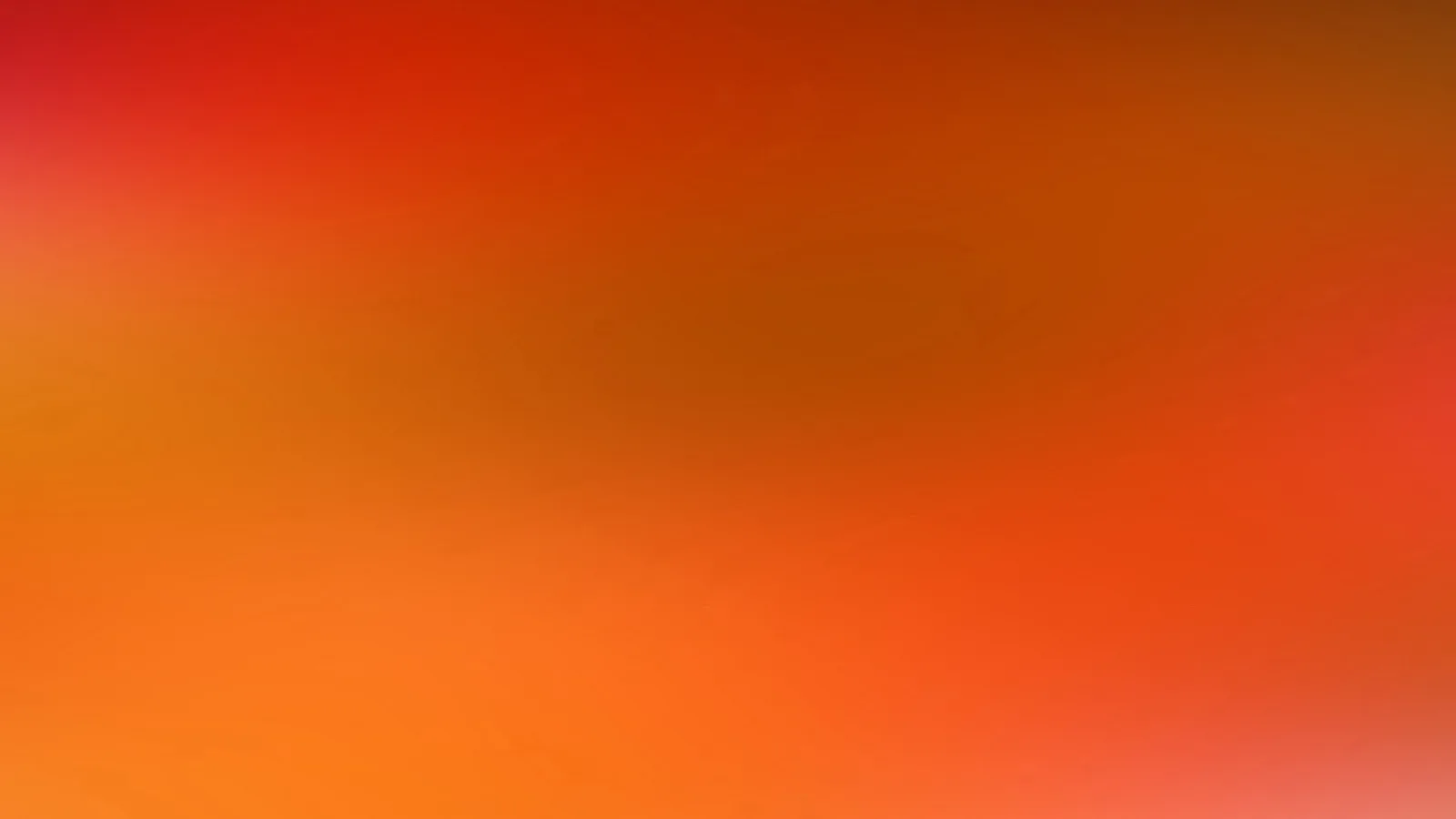 Weicher Farbverlauf von Rot oben links über Orange bis Hellorange unten, mit dunkleren Braunrot-Tönen in der Mitte.