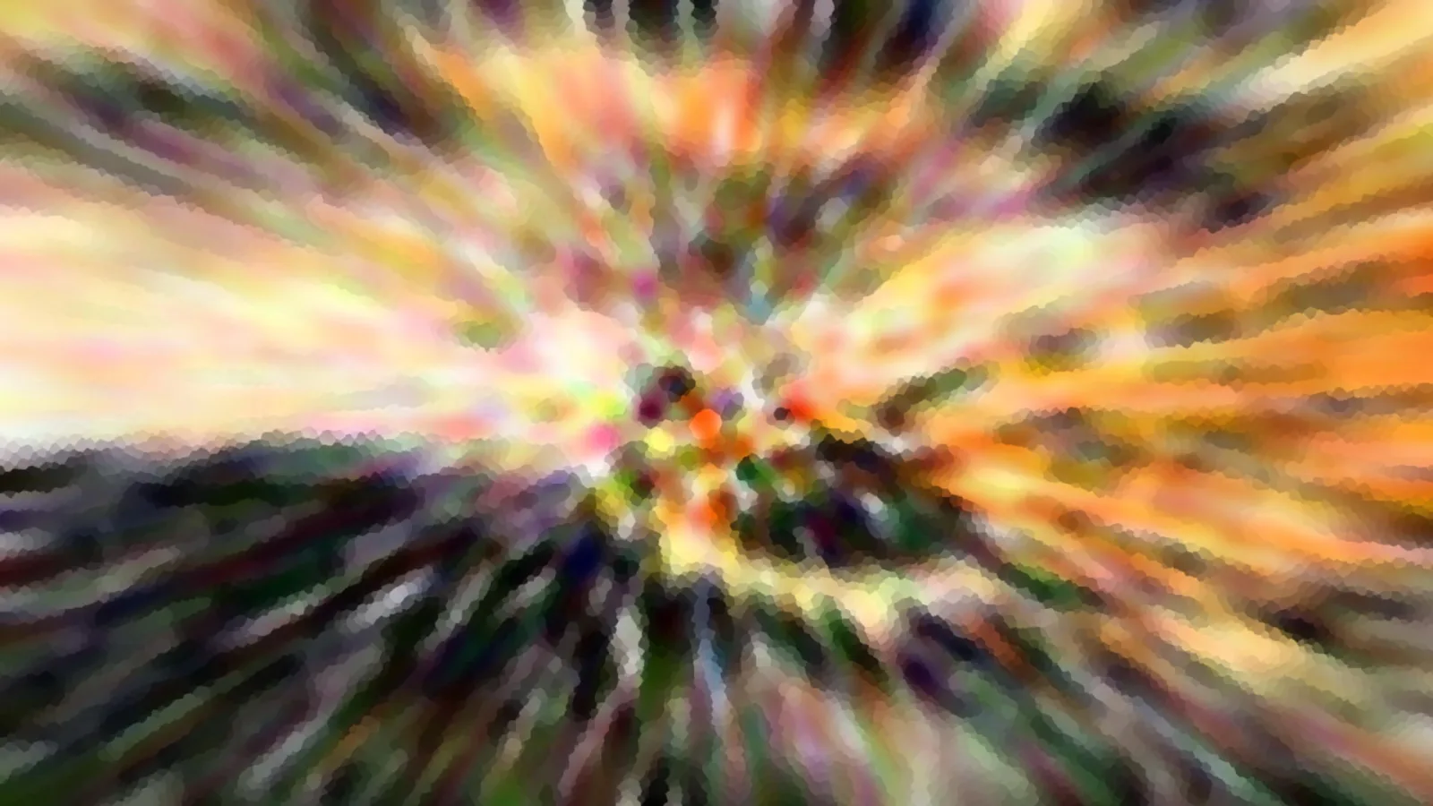 Abstraktes Bild mit radial verwischten Farbstreifen in Orange, Gelb, Grün und Dunkelblau, die von einem hellen Zentrum nach außen laufen.