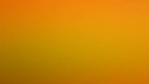 Flächiger Farbverlauf von kräftigem Orange oben zu Gelb und Ocker unten, ohne erkennbare Motive.