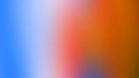 Unscharfer Farbverlauf von Blau über Weiß und Rosa bis zu Orange und Braun, von links nach rechts.