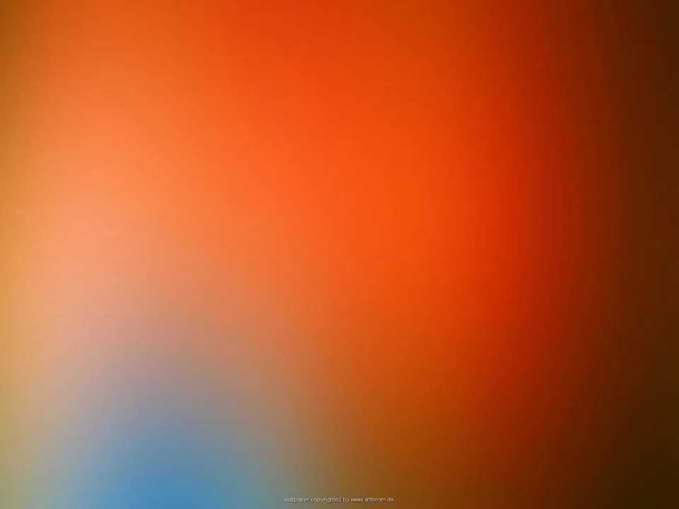 Unscharfer Farbverlauf von Orange über Rot bis Dunkelbraun, unten links ein blauer Lichtfleck.
