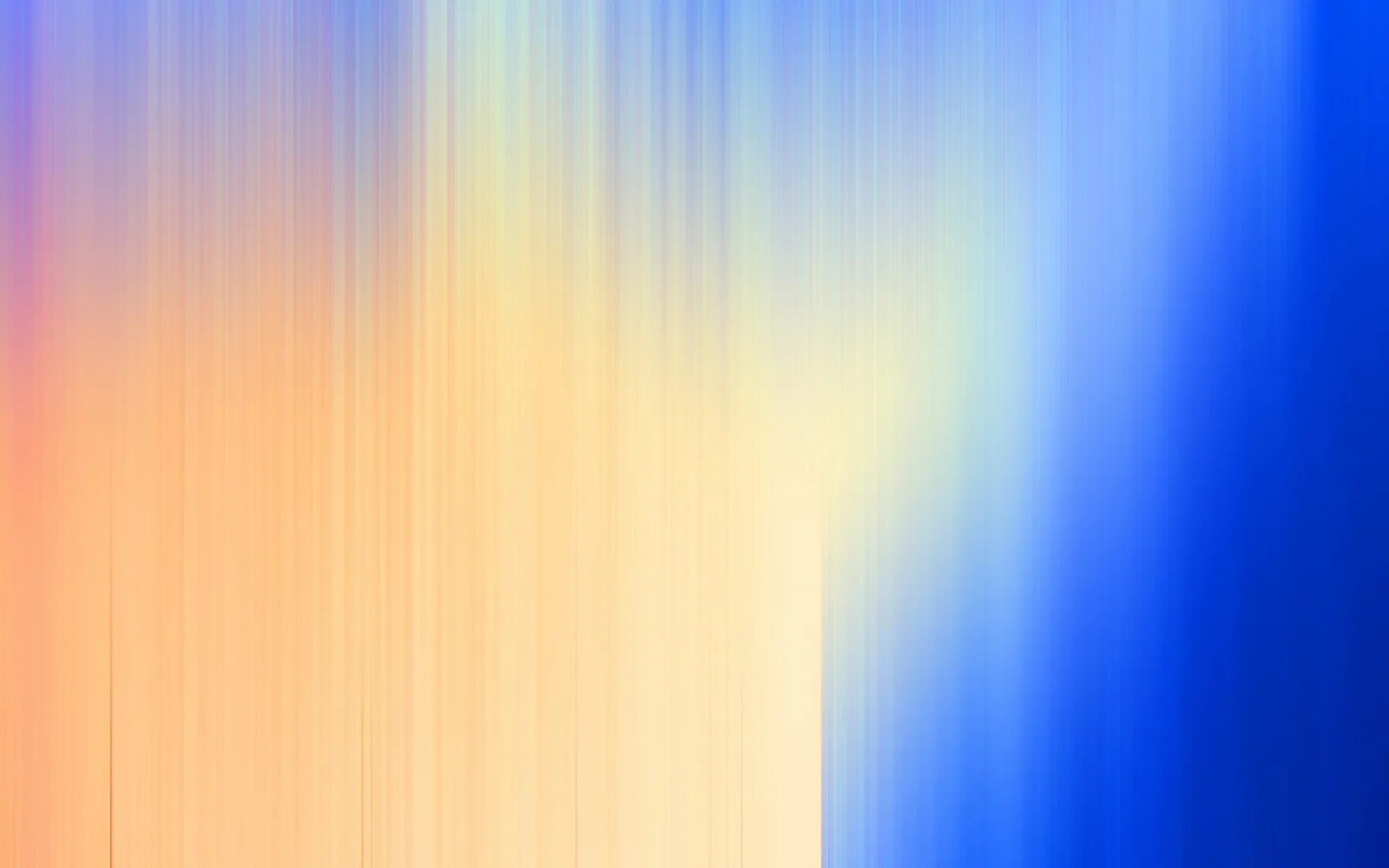 Abstrakter Farbverlauf aus senkrechten, unscharfen Streifen in Orange, Gelb und Hellblau, rechts in tiefes Blau übergehend.