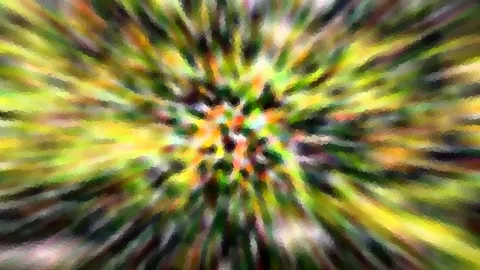 Abstrakte Komposition aus gelben, grünen und orangefarbenen Streifen, die vom Bildzentrum radial nach außen laufen und pixelig verwischen.
