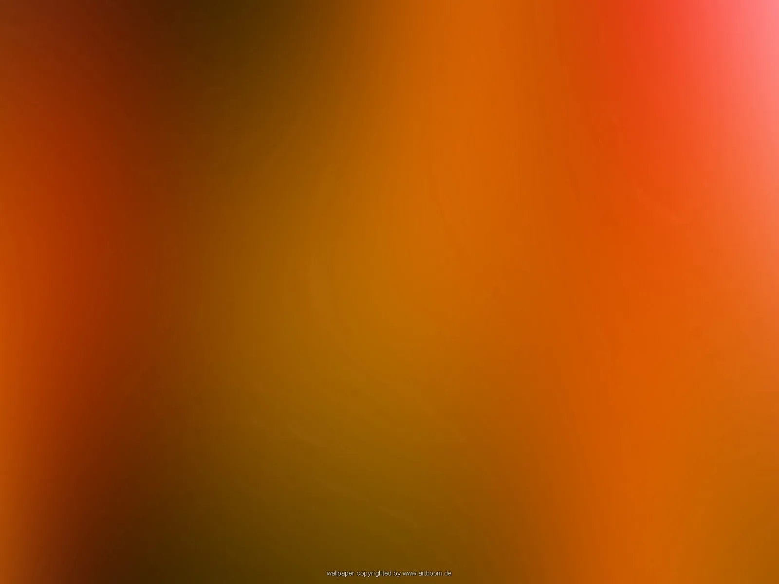 Unscharfer Farbverlauf aus Orange, Rot und Dunkelbraun, oben rechts ein heller rosa Lichtfleck.