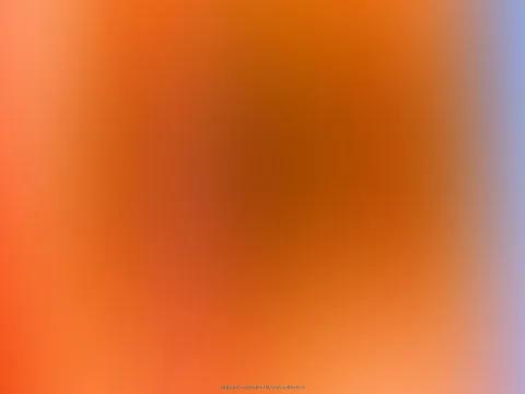 Unscharfer Farbverlauf in Orange und Braun, am rechten Rand ein blasser blaugrauer Streifen.