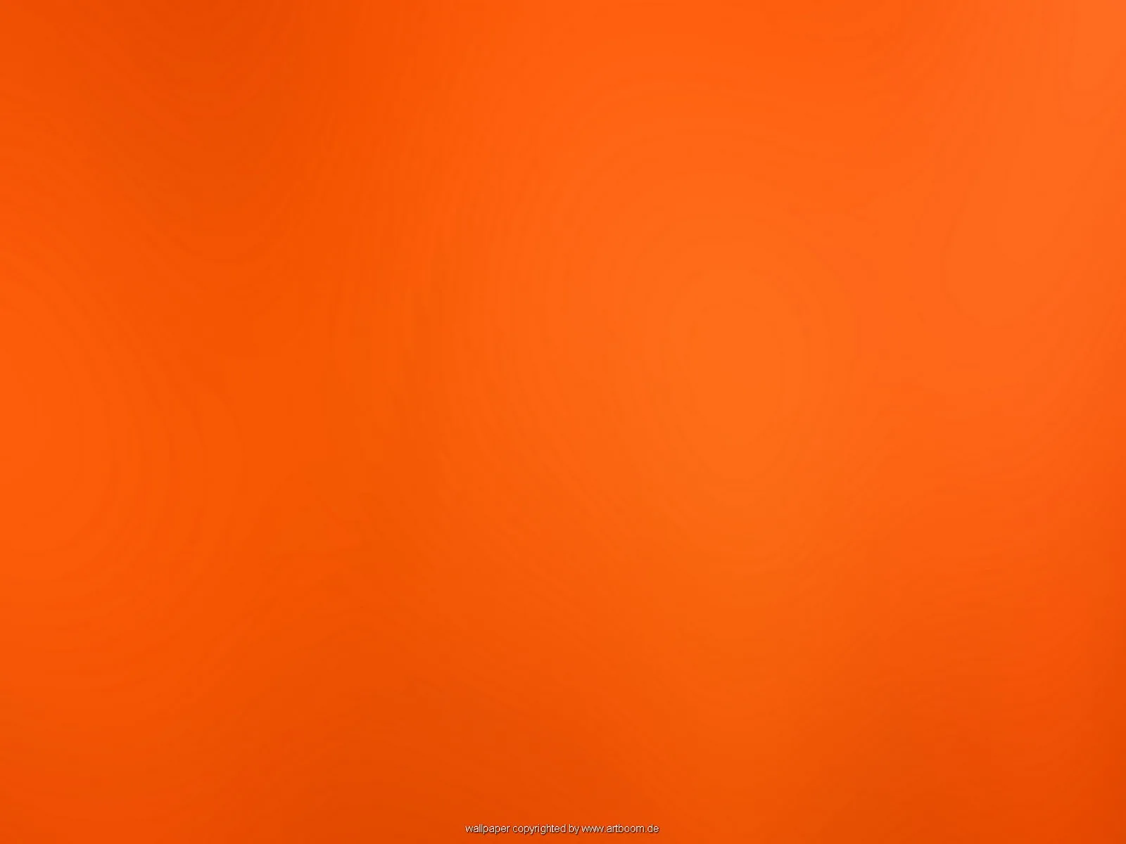 Gleichmäßiger orangefarbener Farbverlauf mit leicht hellerer Mitte und dunkleren Rändern, ohne erkennbare Motive.