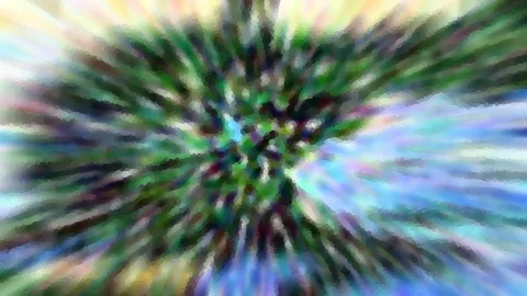Abstraktes Bild mit radialen Streifen in Grün, Blau, Weiß und Rosa, die von einem dunkleren Zentrum nach außen laufen, mit grobem Pixelmosaik.