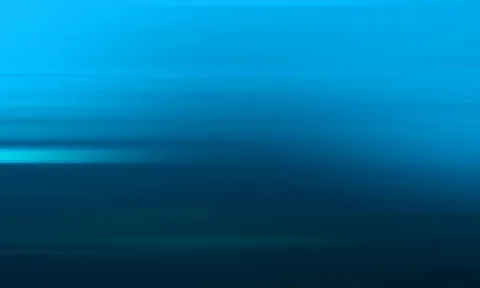 Horizontal verwischte Lichtstreifen in Hellblau und Dunkelblau, die von links nach rechts in einen dunklen Verlauf übergehen.