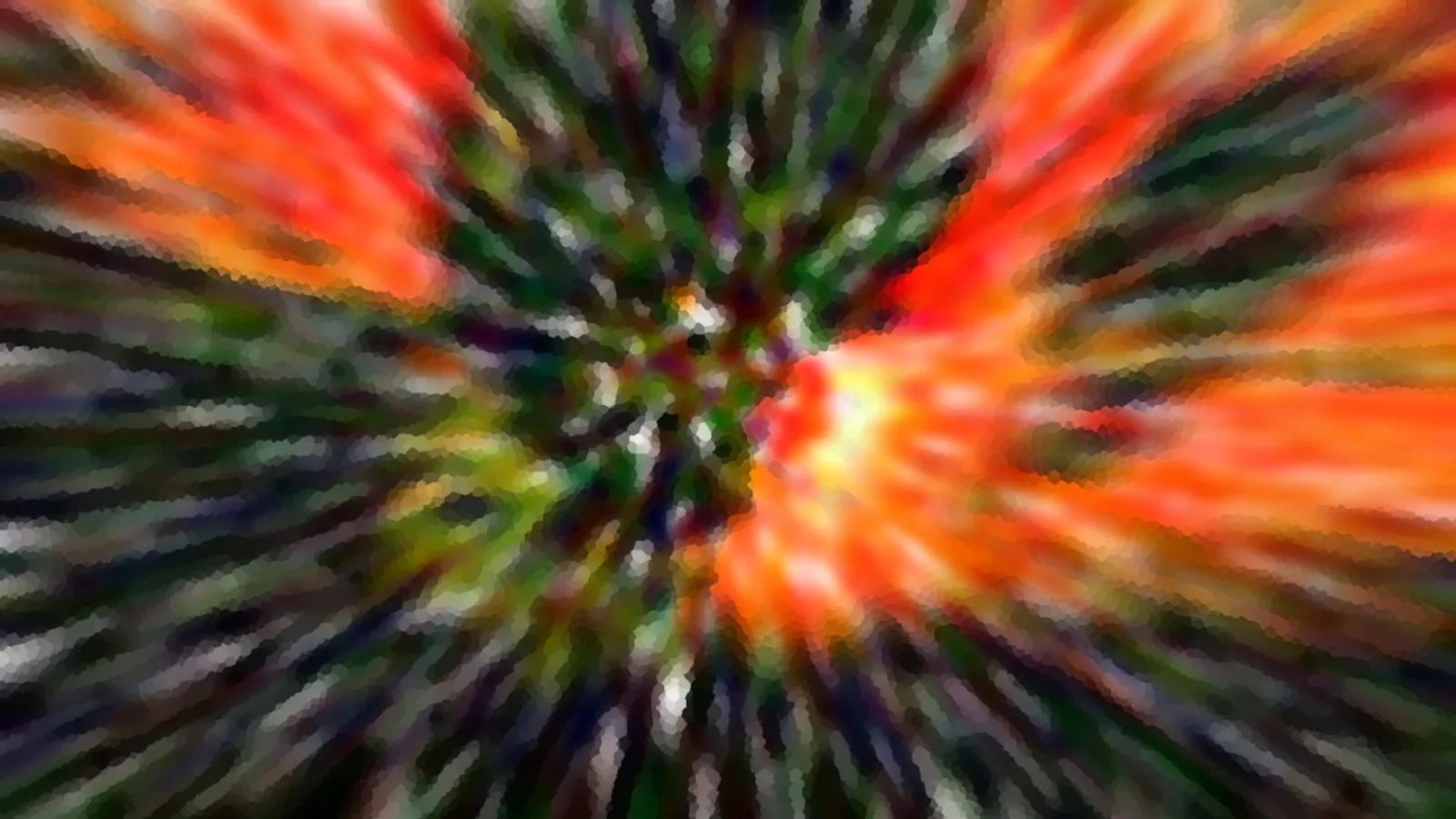 Abstrakte Aufnahme mit radialen Streifen, die von einem hellen Zentrum rechts der Mitte nach außen laufen. Dominierende Farben sind Orange, Rot und Grün, dazwischen dunkle Schlieren, alles stark verwischt und grob gepixelt.