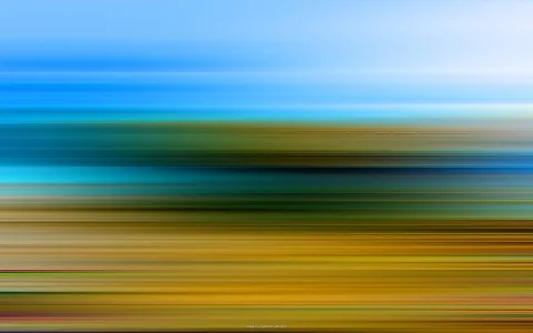 Horizontal verwischte Streifen, die von Blau über Türkis und Grün bis zu Gold verlaufen.