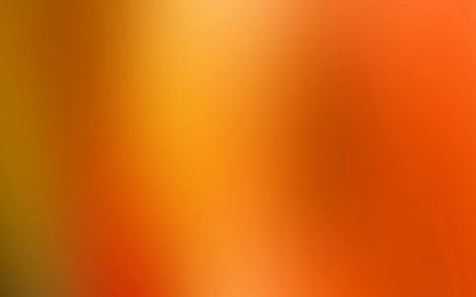 Weicher Farbverlauf in Orange, Gelb und Rot, von helleren Gelbtönen oben links zu dunklerem Rot unten rechts.