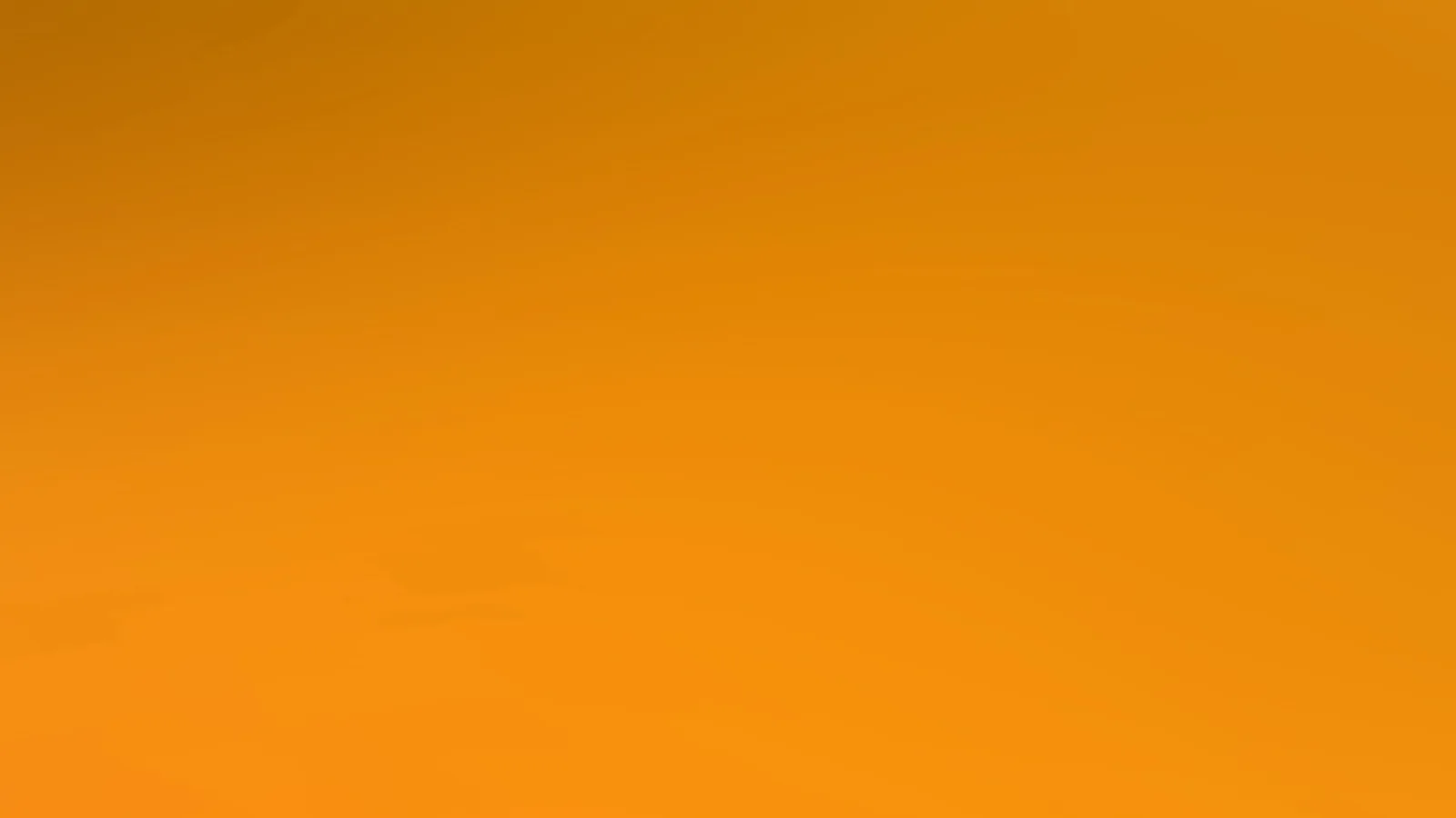Weicher Farbverlauf in Orange, oben dunkler und unten heller, ohne erkennbare Motive.