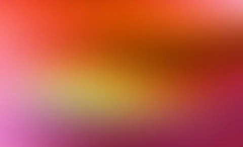 Unscharfer Farbverlauf von Orange über Gelb bis Magenta, oben hell orange, unten violett-rosa.