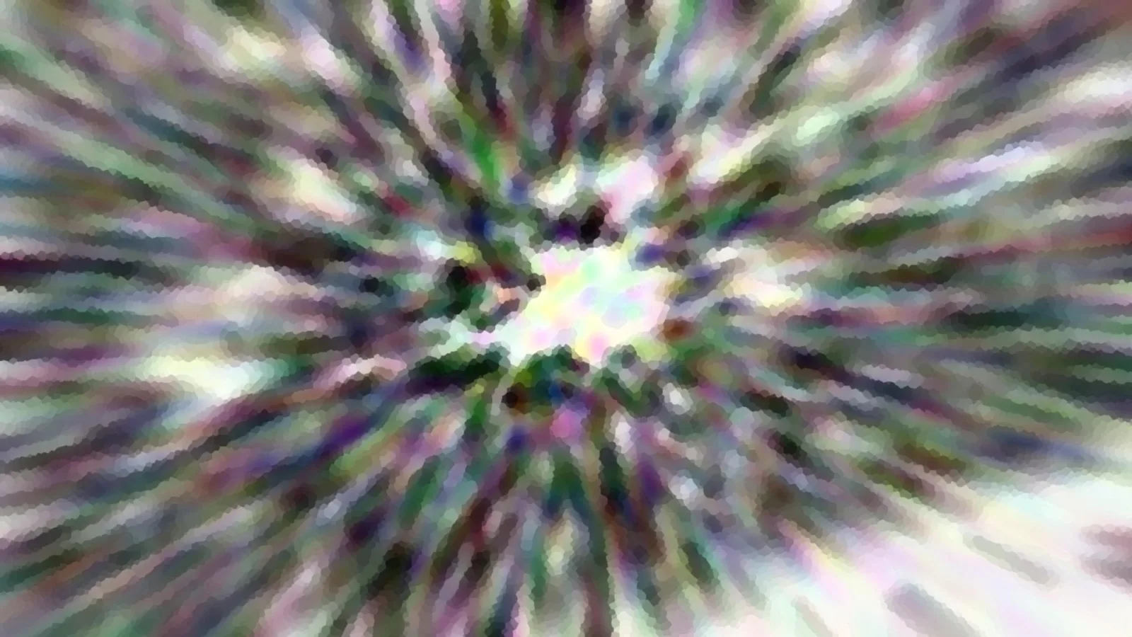 Abstrakte radiale Unschärfe mit bunten Farbstreifen in Grün, Violett und Weiß, die von einem hellen Zentrum nach außen strahlen.