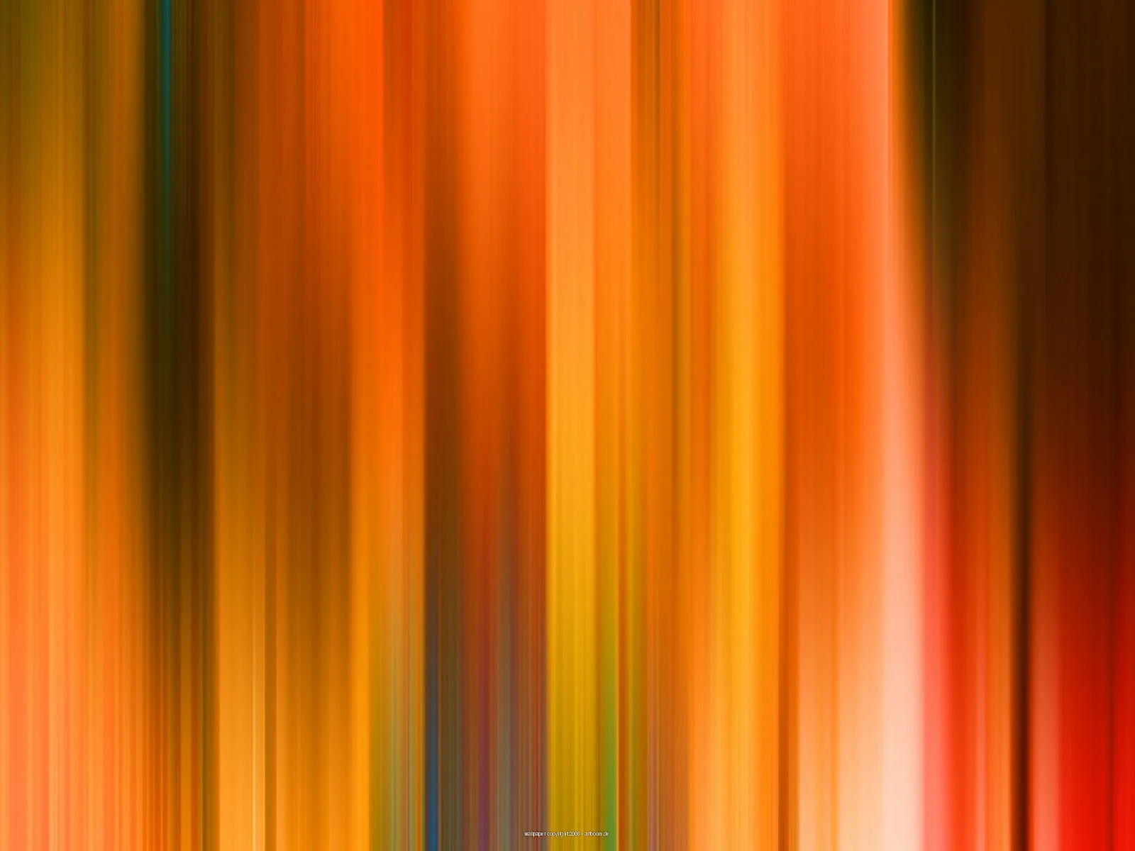Abstrakte Komposition aus vertikalen, weich verwischten Streifen in Orange, Gelb, Rot und Braun, dazwischen vereinzelt Blau und Grün.