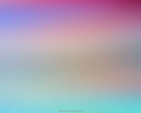 Unscharfer Farbverlauf von Magenta oben über Blau und Beige bis Türkis unten