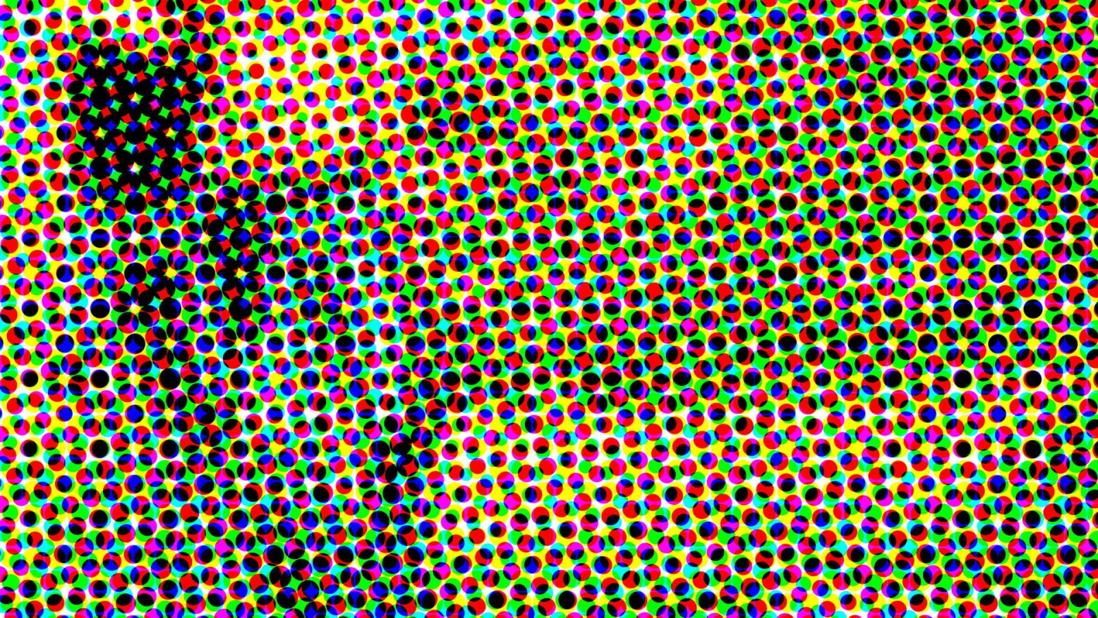 Dichtes Raster aus bunten Punkten in Rot, Grün, Blau und Gelb auf weißem Grund, mit einem dunklen, diagonal verlaufenden Bereich links.