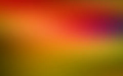Weich verwischter Farbverlauf von Rot oben über Orange bis Olivgrün unten, rechts oben ein violetter Schimmer.
