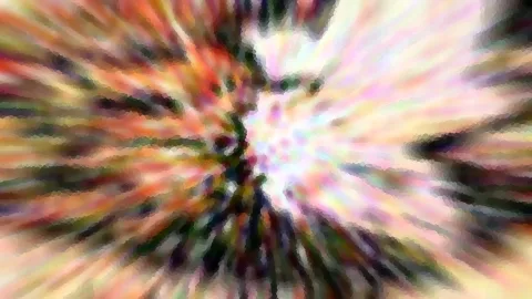 Abstrakte radiale Unschärfe mit bunten Streifen in Orange, Grün, Rosa und Weiß, die von einem hellen Zentrum nach außen laufen.