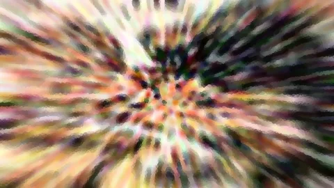 Abstraktes Bild mit radialem Zoomeffekt, bunte Farbstreifen laufen von einem dunklen Zentrum nach außen, mosaikartig gepixelt.