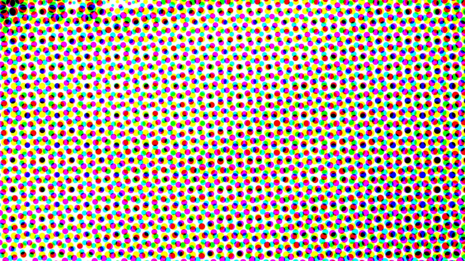 Dichtes, leicht versetztes Raster aus bunten Punkten in Rot, Gelb, Grün, Cyan, Magenta und Schwarz auf weißem Grund.