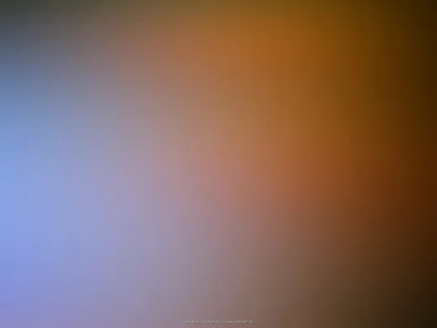 Unscharfer Farbverlauf: links kühles Blau und Lavendel, rechts warmes Orange und Braun, zum oberen rechten Rand dunkler werdend.