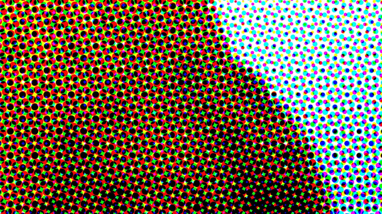 Dichtes Raster aus bunten Punkten in Rot, Grün, Gelb, Blau, Cyan und Magenta auf Schwarz und Weiß, das von links nach rechts in helle Fläche übergeht.