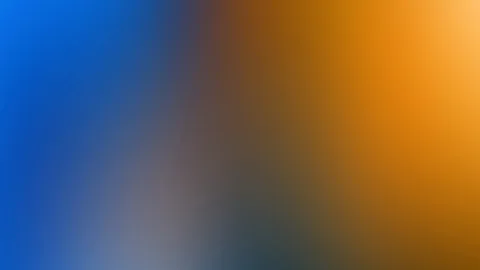 Unscharfer Farbverlauf von Blau links über Grau in der Mitte zu warmem Orange rechts