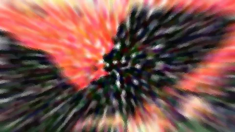 Abstrakte Komposition aus radial angeordneten, verwischten Streifen in Rot, Orange, Schwarz und Grün, die von einem dunklen Zentrum nach außen strahlen.
