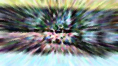 Abstraktes Bild mit farbigen Streifen, die von einem hellen Zentrum radial nach außen laufen, in Grün, Blau, Violett und Rosa.