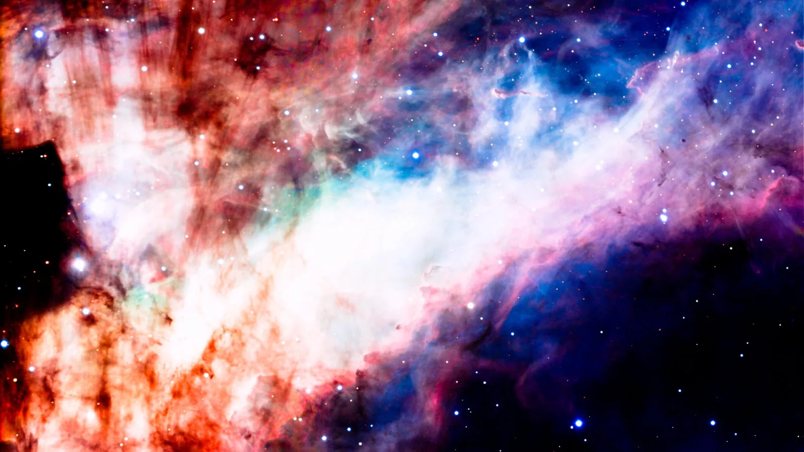 Leuchtende Gas- und Staubwolken in Rot, Weiß und Blau mit vielen hellen Sternen vor schwarzem Hintergrund