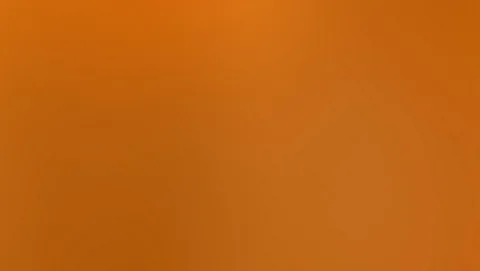 Flächiger orangefarbener Farbverlauf mit helleren und dunkleren Bereichen und sanften Schlieren, ohne erkennbare Motive.