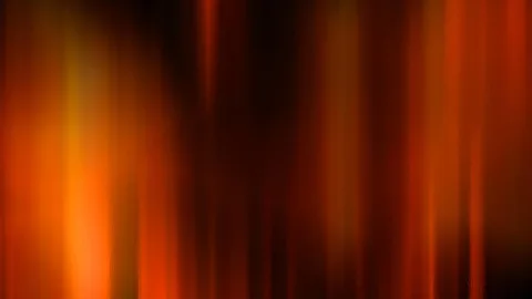 Abstrakte Komposition aus unscharfen, vertikalen Streifen in Orange, Rot und Gelb vor dunklem Hintergrund, hell am linken Rand, dunkel in der Mitte.