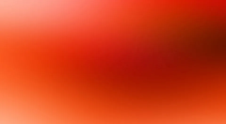 Weicher, unscharfer Farbverlauf von Hellorange links oben über kräftiges Rot bis zu dunklem Rotbraun rechts oben.
