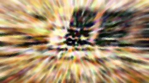 Abstraktes Bild mit farbigen Strahlen, die von einem dunklen Zentrum nach außen laufen, mosaikartig verpixelt.