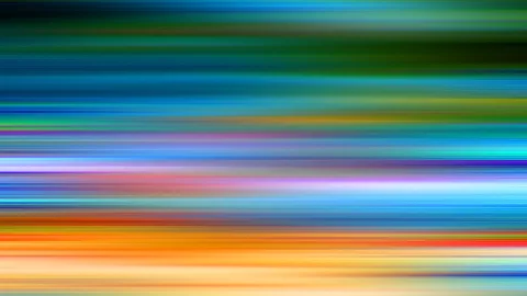 Horizontal verwischte Lichtstreifen in Blau, Grün, Violett, Rosa, Orange und Rot, die von oben nach unten ineinanderlaufen.
