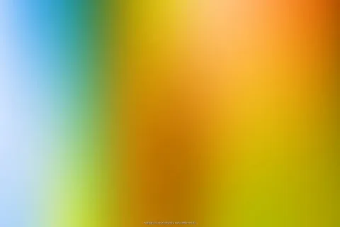 Unscharfer Farbverlauf von Blau über Grün und Gelb bis Orange