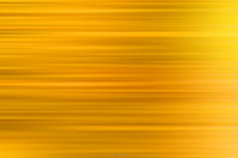 Horizontal verlaufende, verschwommene Streifen in Gelb und Orange, die von rechts oben heller leuchten.