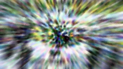 Abstrakte Aufnahme mit radial von einem dunklen Zentrum nach außen laufenden, bunten Streifen in Grün, Violett, Gelb und Weiß.