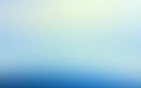 Weicher Farbverlauf von hellem Gelbgrün oben über helles Hellblau bis zu kräftigem Blau am unteren Bildrand.