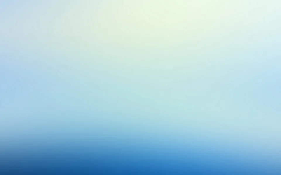 Weicher Farbverlauf von hellem Gelbgrün oben über helles Hellblau bis zu kräftigem Blau am unteren Bildrand.