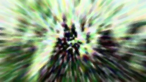 Abstrakte, radial verwischte Aufnahme in Grün, Weiß und Violett mit einem dunklen Zentrum.