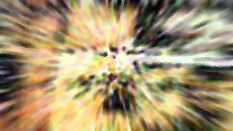 Abstraktes Bild mit farbigen, radial von einem Zentrum ausstrahlenden Streifen in Gelb, Grün, Orange und Violett, leicht verschwommen und blockartig gepixelt.