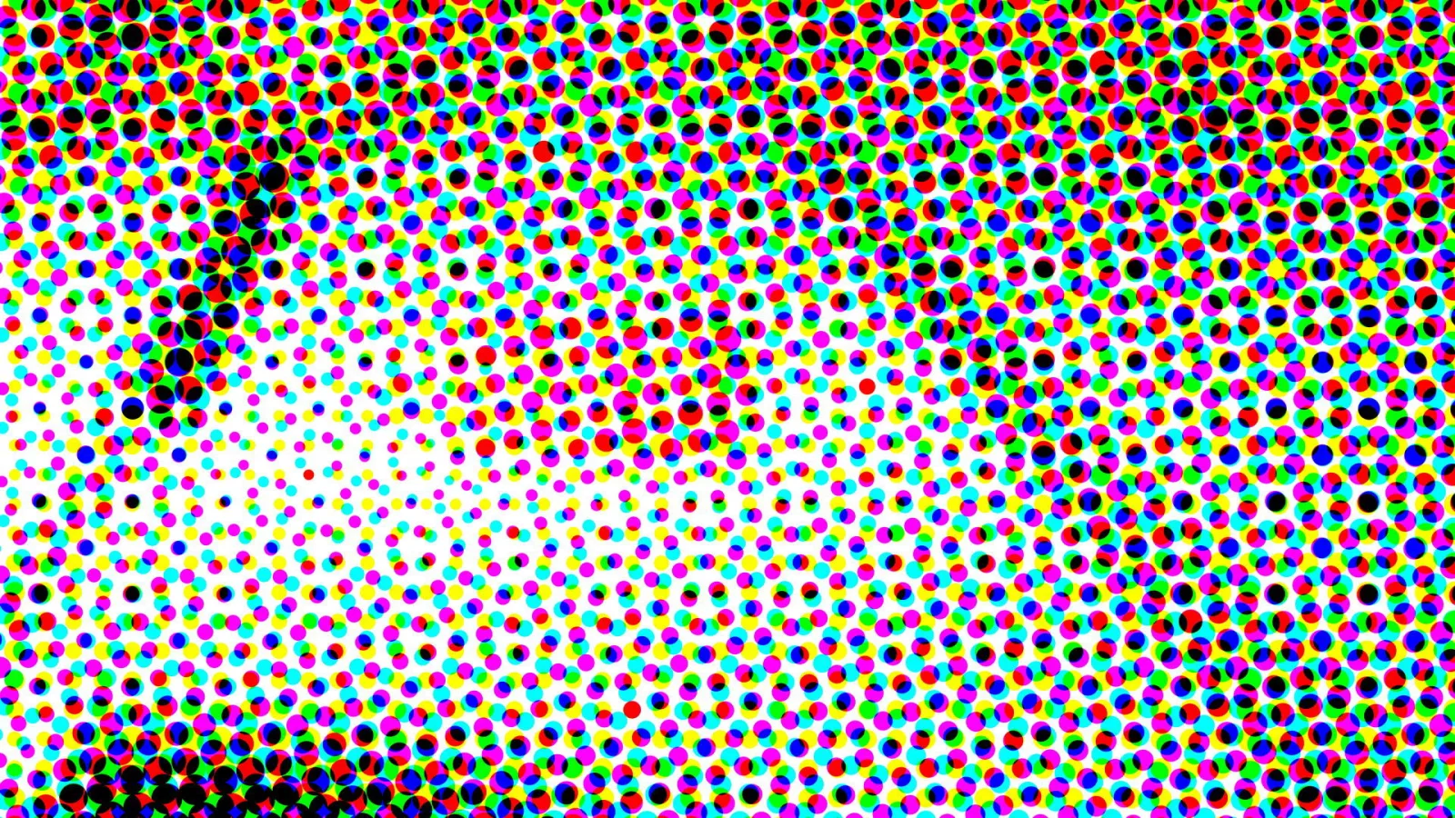 Dichtes Raster aus kleinen bunten Punkten in Rot, Grün, Blau, Gelb, Magenta und Schwarz, in der Mitte und links oben heller, zu den Rändern hin dichter und dunkler.