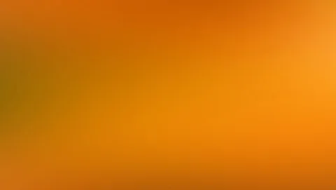 Unscharfer Farbverlauf in Orange und Ocker, links am Rand leicht ins Olivgrüne übergehend, rechts heller.