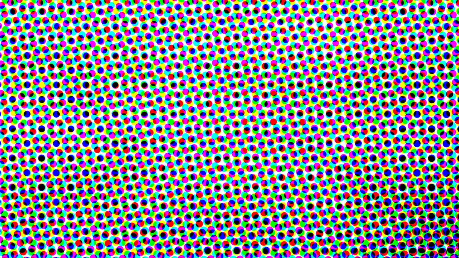 Dichtes Raster aus kleinen farbigen Punkten in Rot, Grün, Blau, Gelb, Cyan und Magenta auf weißem Grund, teils mit schwarzen Punkten durchsetzt.