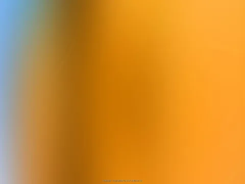 Weicher Farbverlauf von Blau am linken Rand über Braun bis zu kräftigem Orange nach rechts, ohne erkennbare Motive.